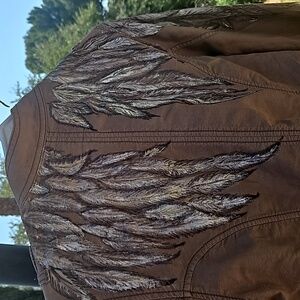 Original hand painted Angel wings on Woman's Jacket painted by me.